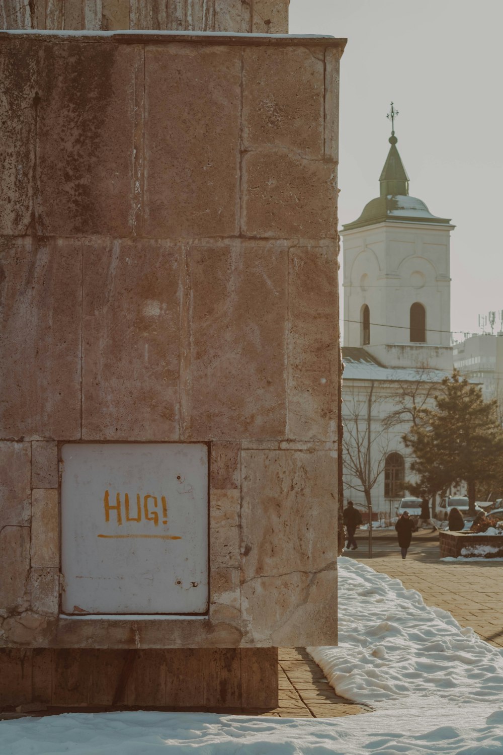 a building with a clock tower in the background