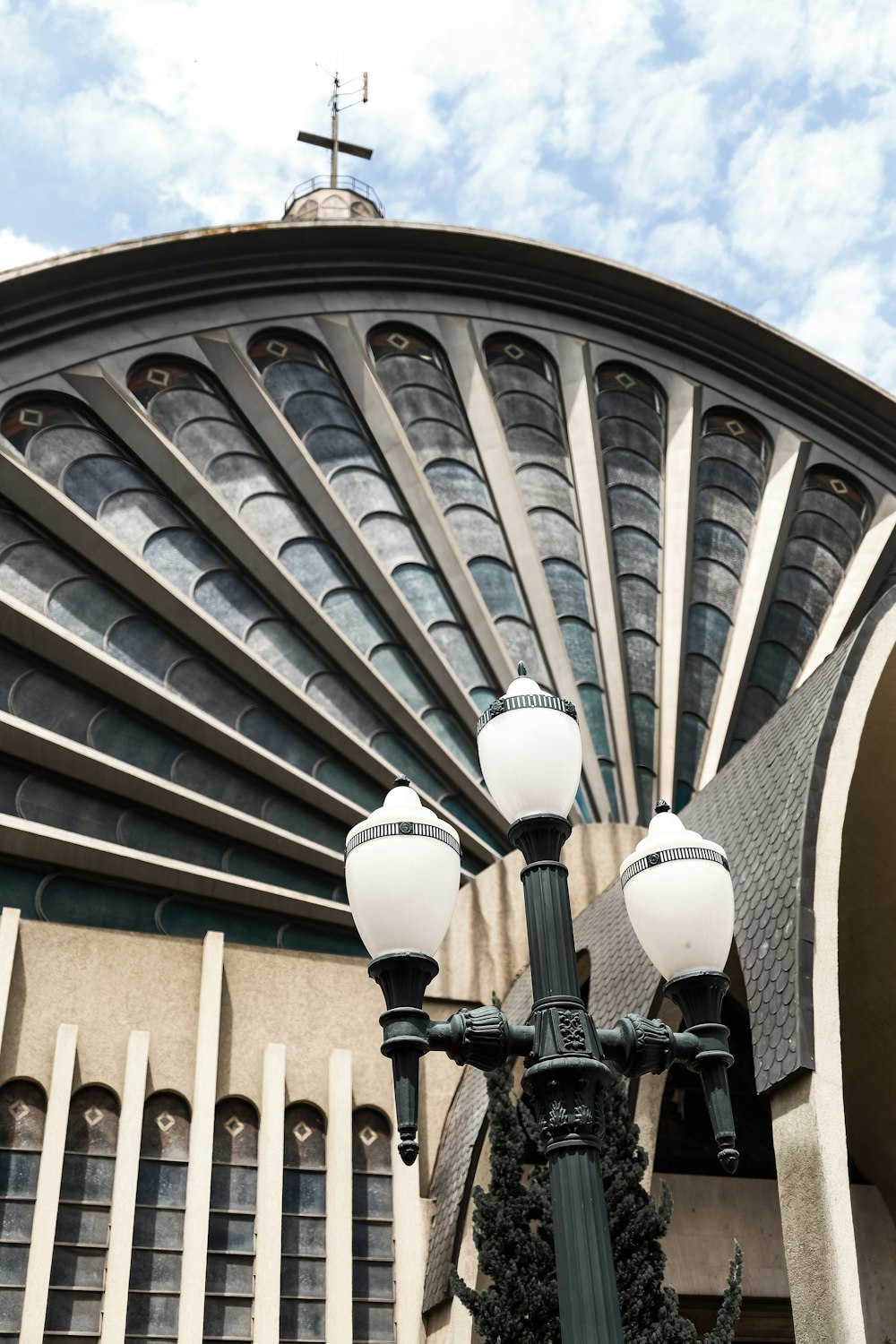 a street light in front of a large building