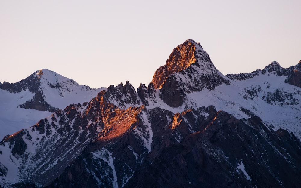 a very tall mountain with a lot of snow on it