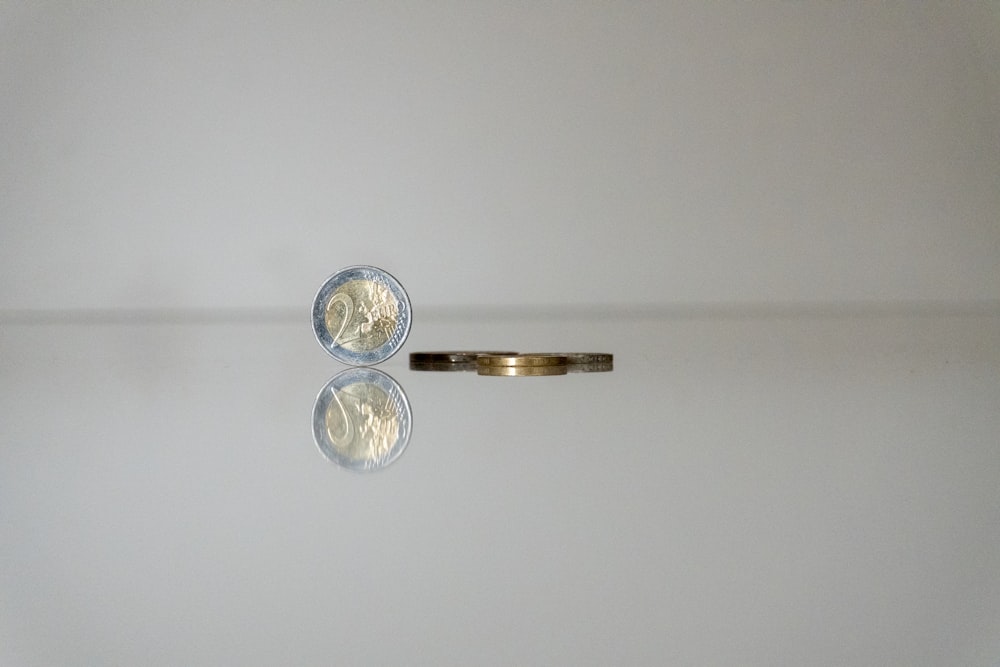 a couple of rings sitting on top of a table