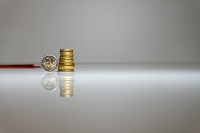 a stack of coins sitting on top of a table