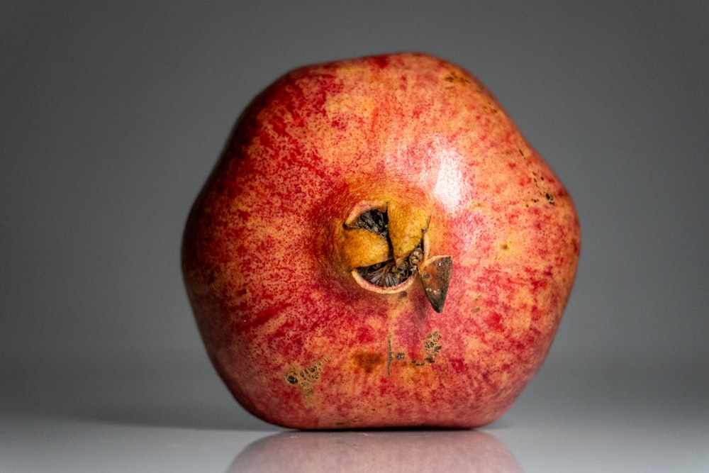 a close up of an apple with a bite taken out of it