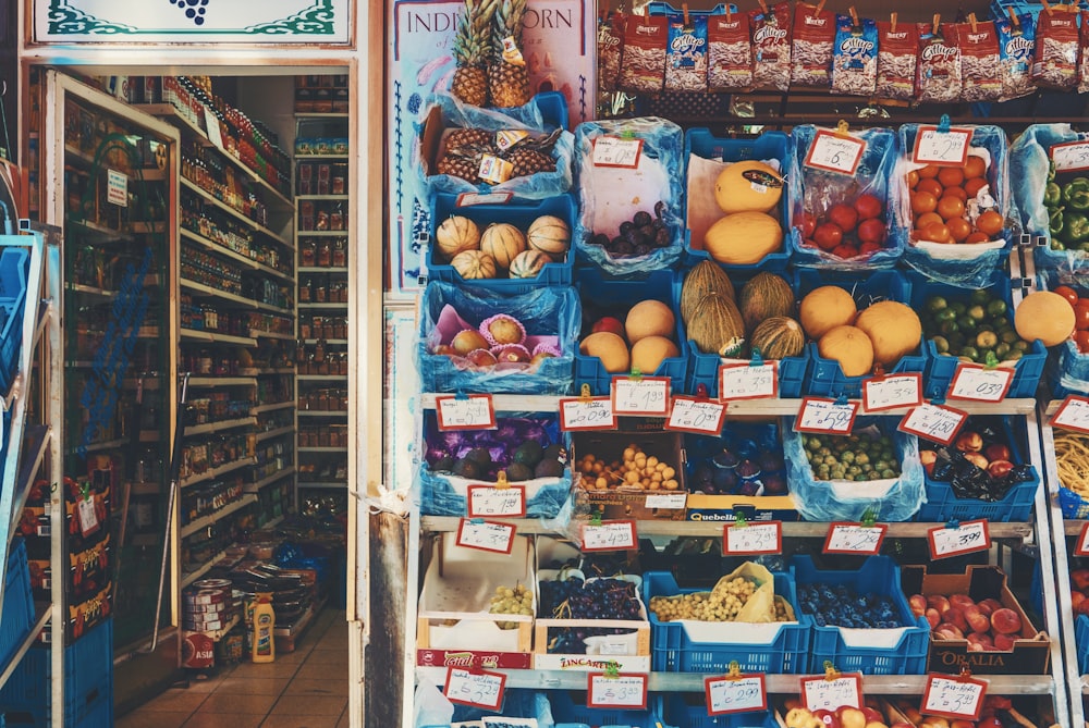 a fruit and vegetable stand in a grocery store