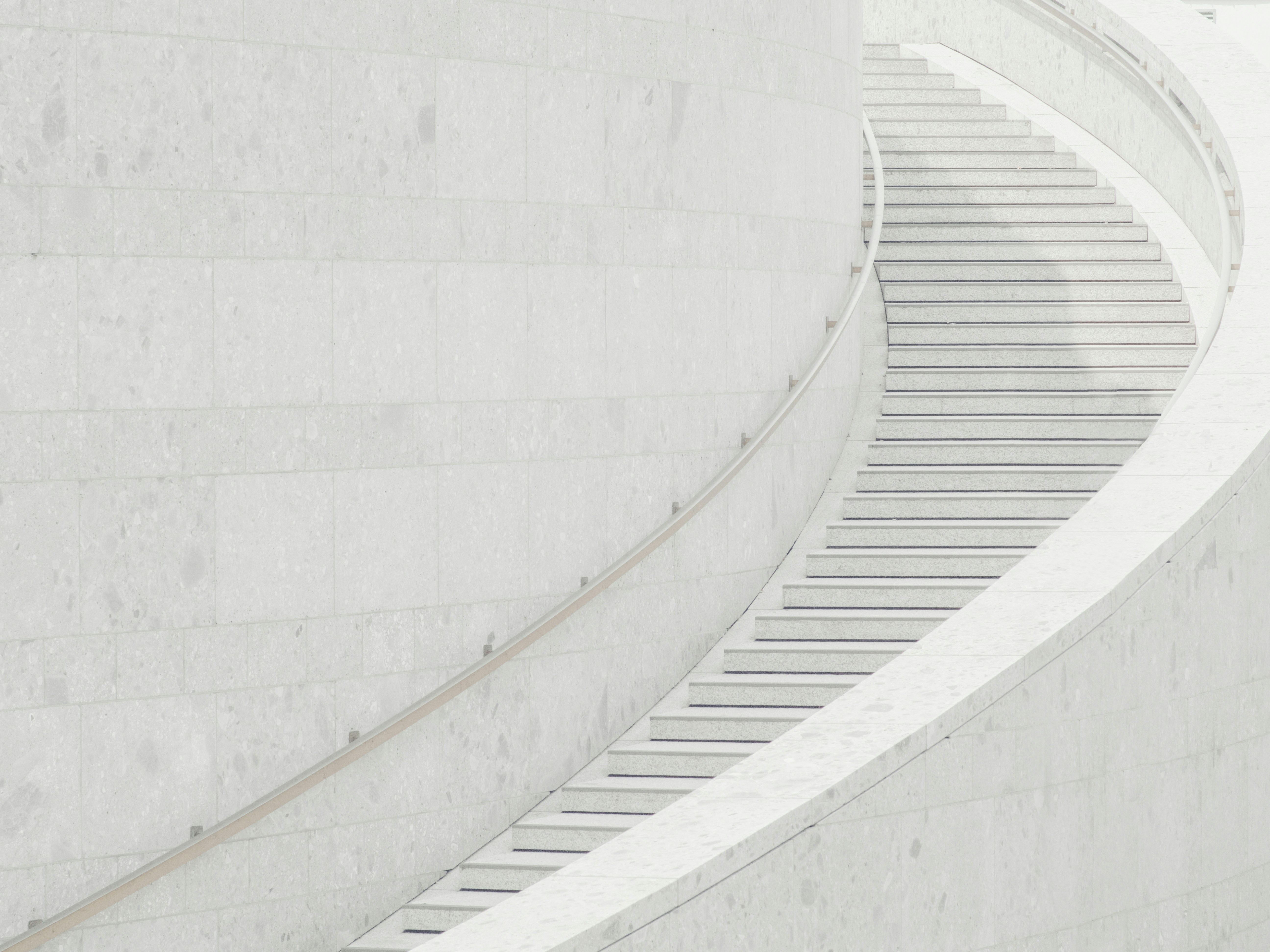 a man riding a skateboard down a set of stairs