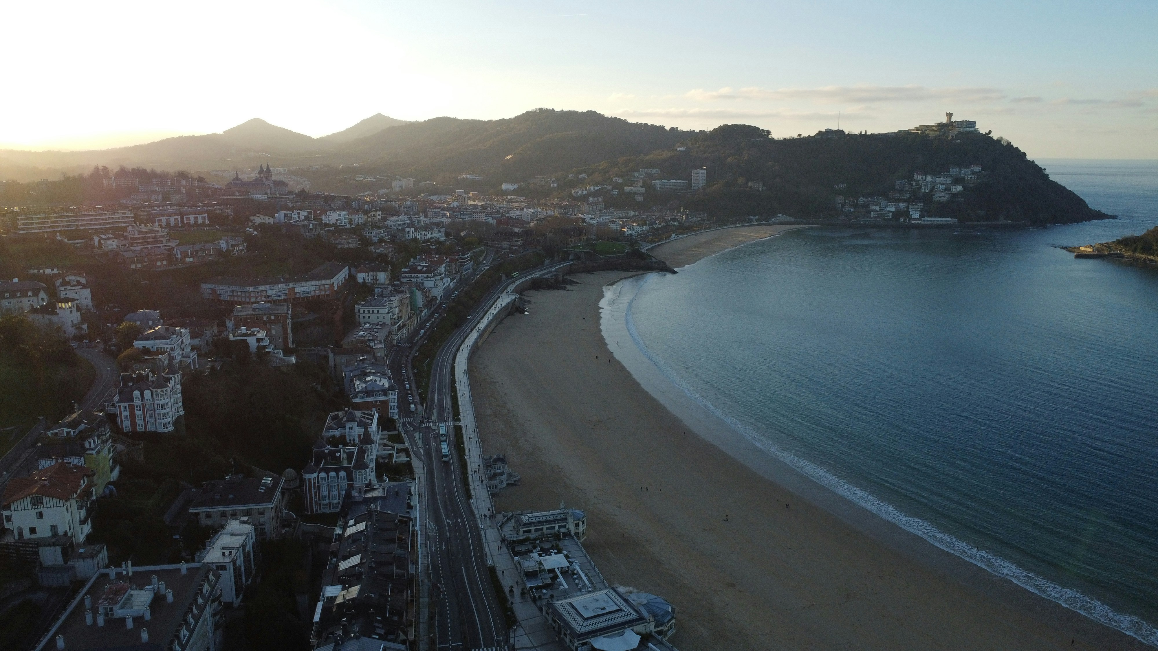 An aerial view of a beach and a city