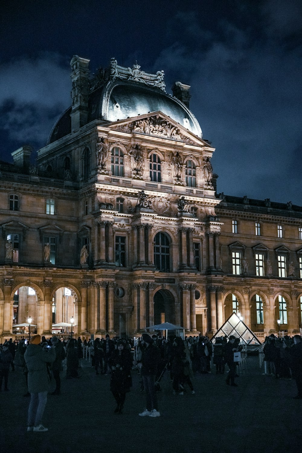 a group of people standing in front of a building