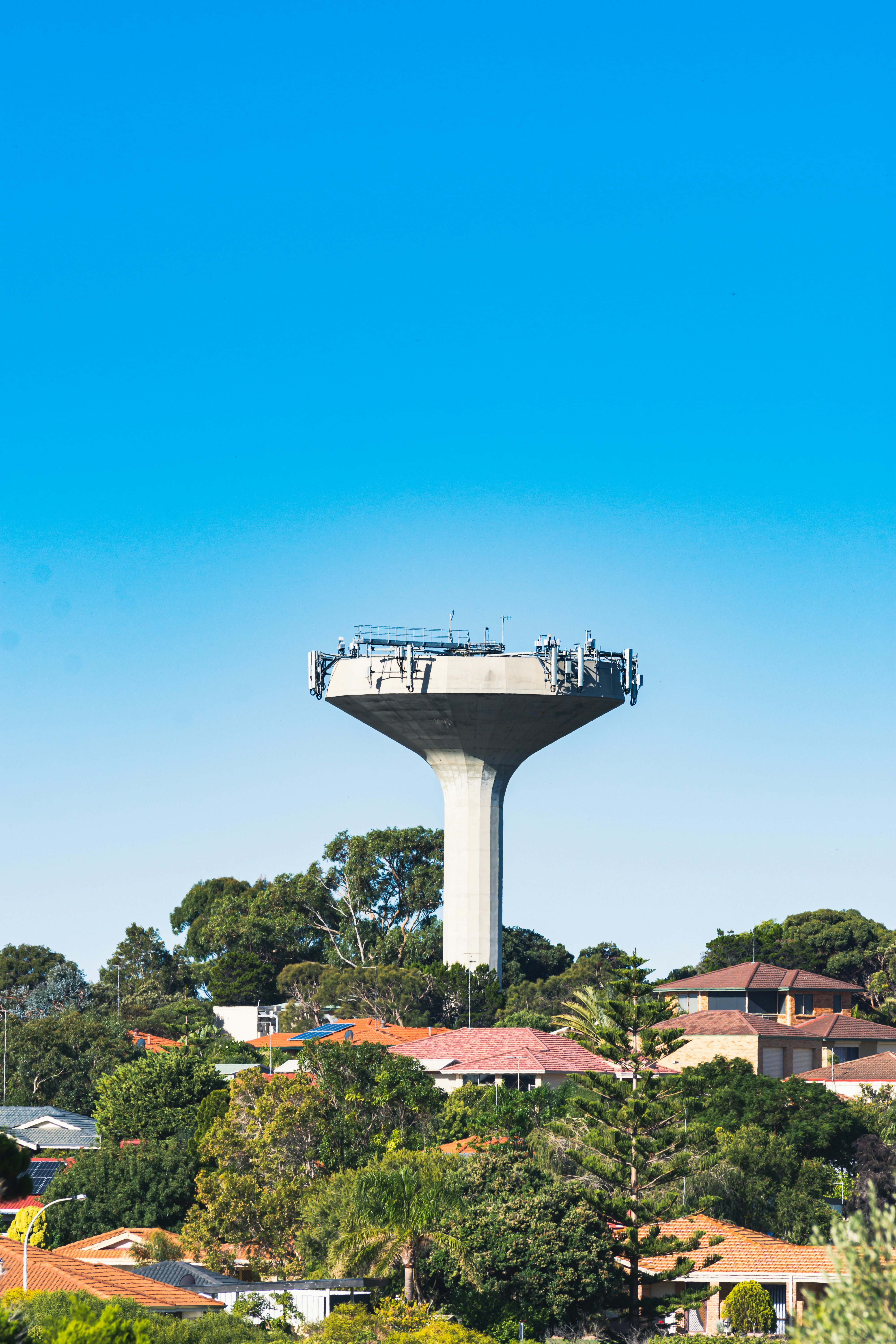 a water tower in the middle of a city