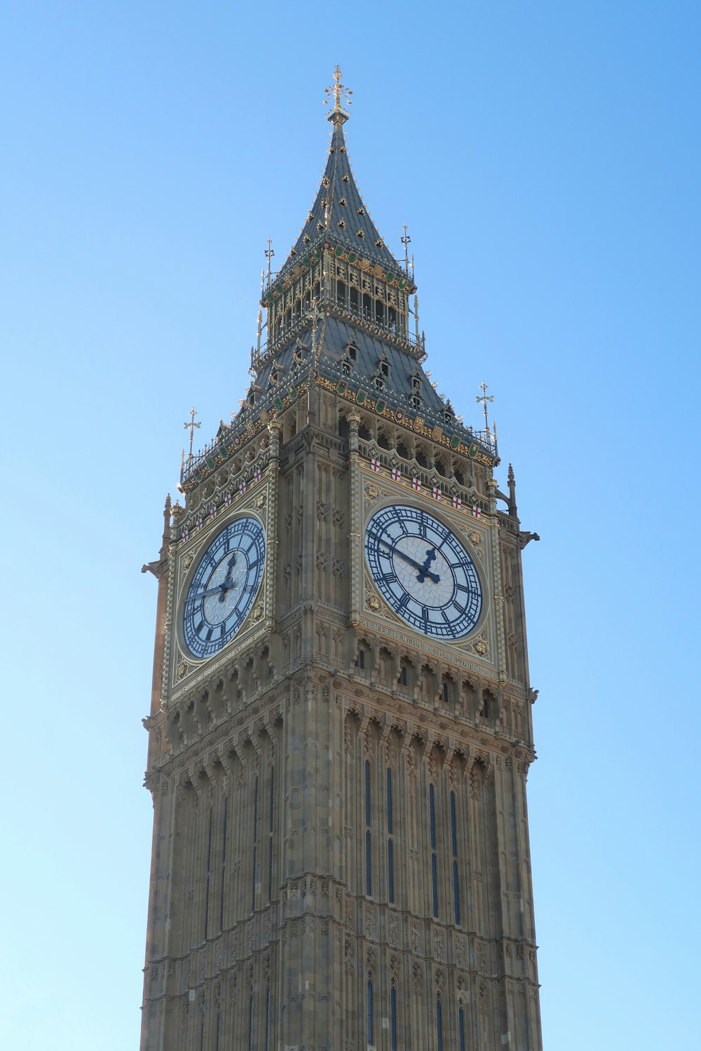 a tall clock tower with a sky background