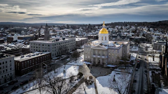 an aerial view of a city in winter