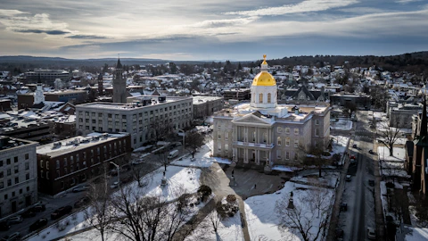 an aerial view of a city in winter