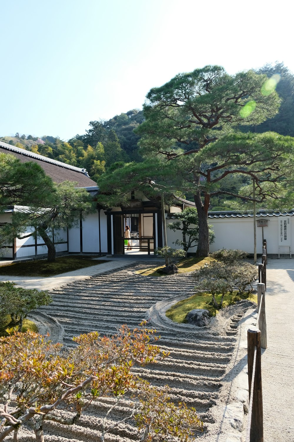 a stone path leading up to a building