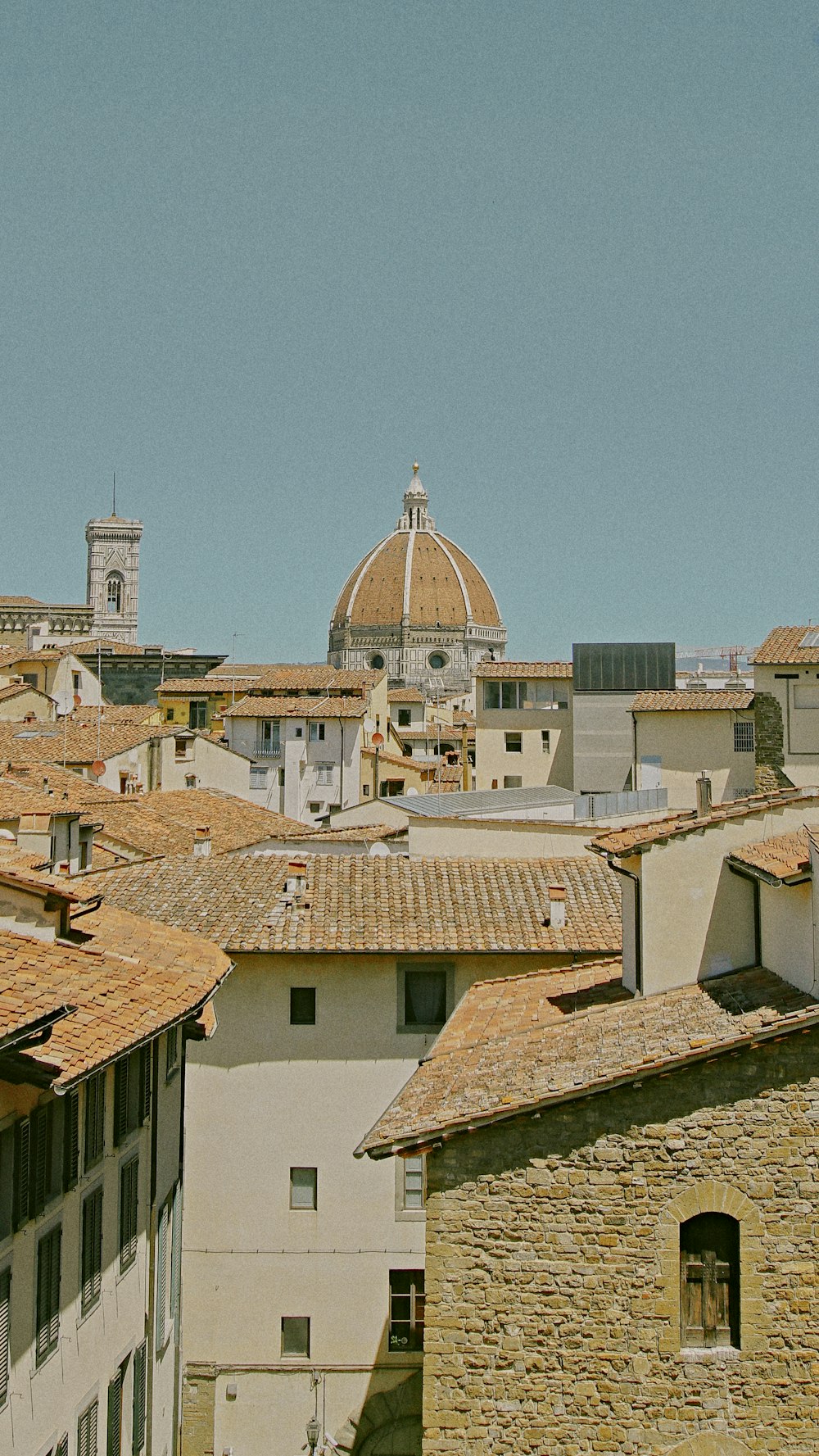 a view of a city with a clock tower