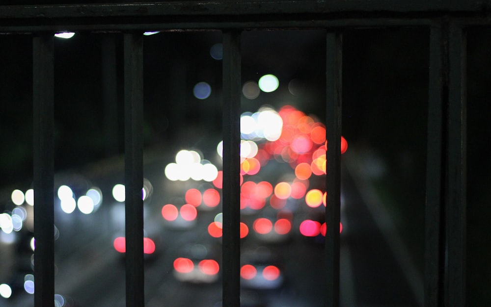 a view of a city street from a window at night