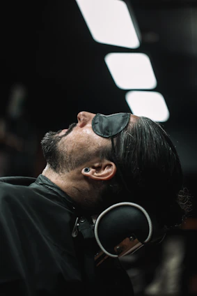 a man with a pair of sunglasses on his face