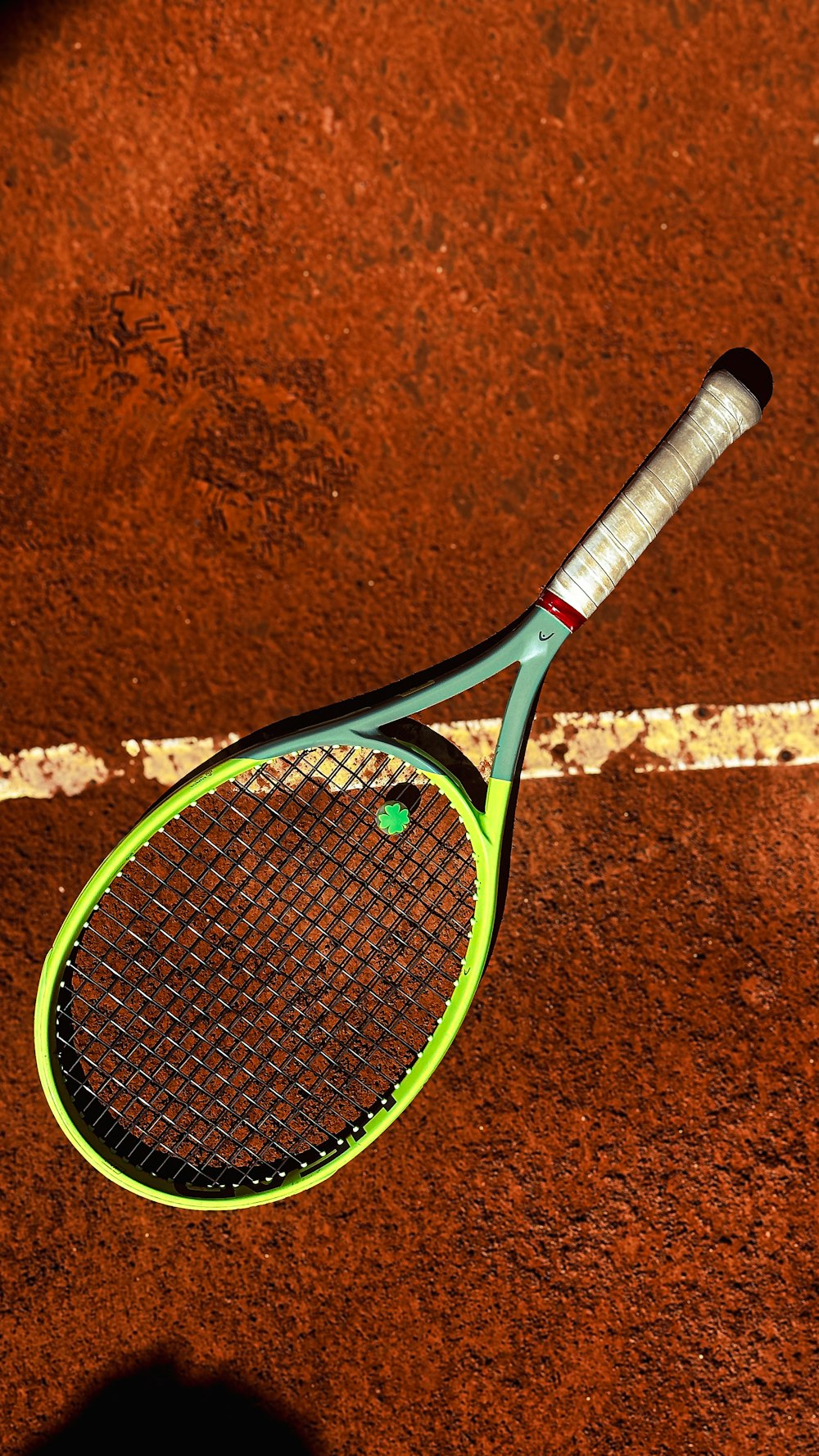 a tennis racket on a tennis court