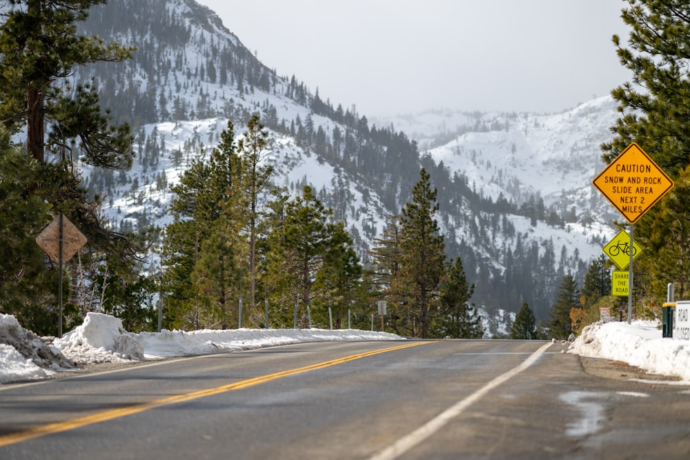 a road with a mountain in the background