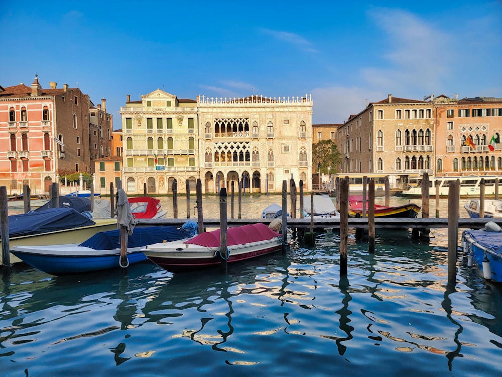 a bunch of boats that are sitting in the water