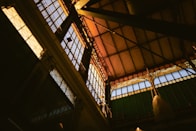 a view of the ceiling of a train station