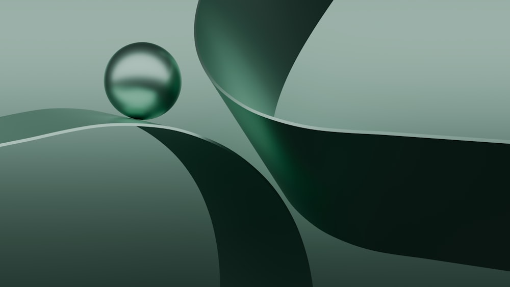 a green abstract background with a drop of water