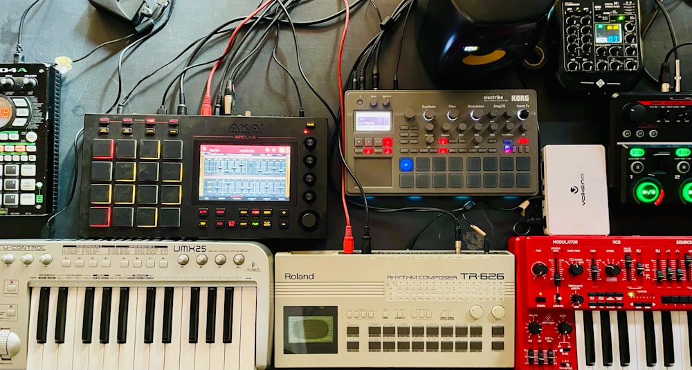 a bunch of electronic equipment sitting on top of a table