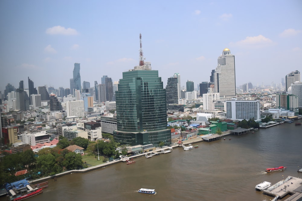 a large body of water with a city in the background