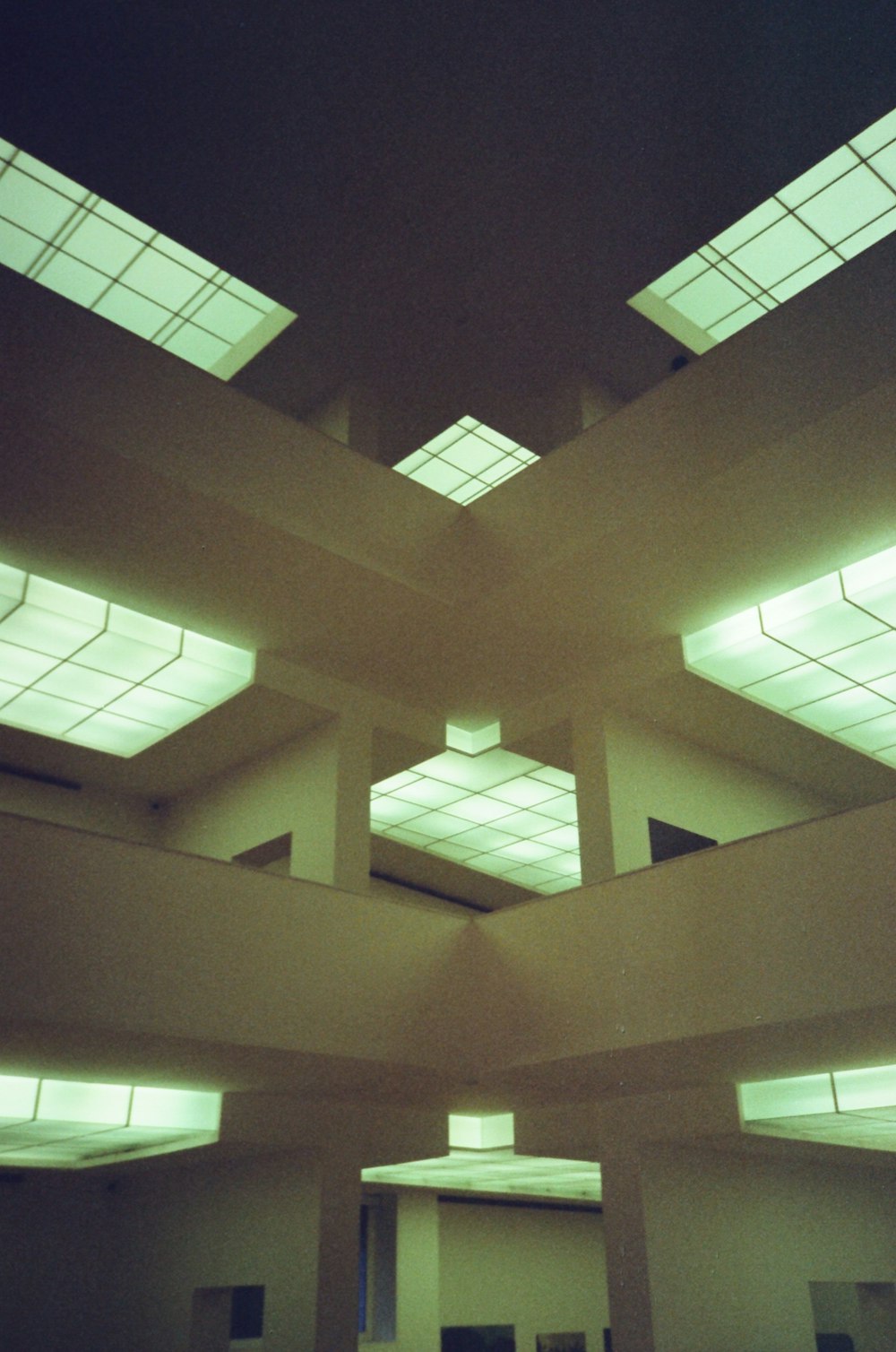 a large room with a bunch of lights on the ceiling