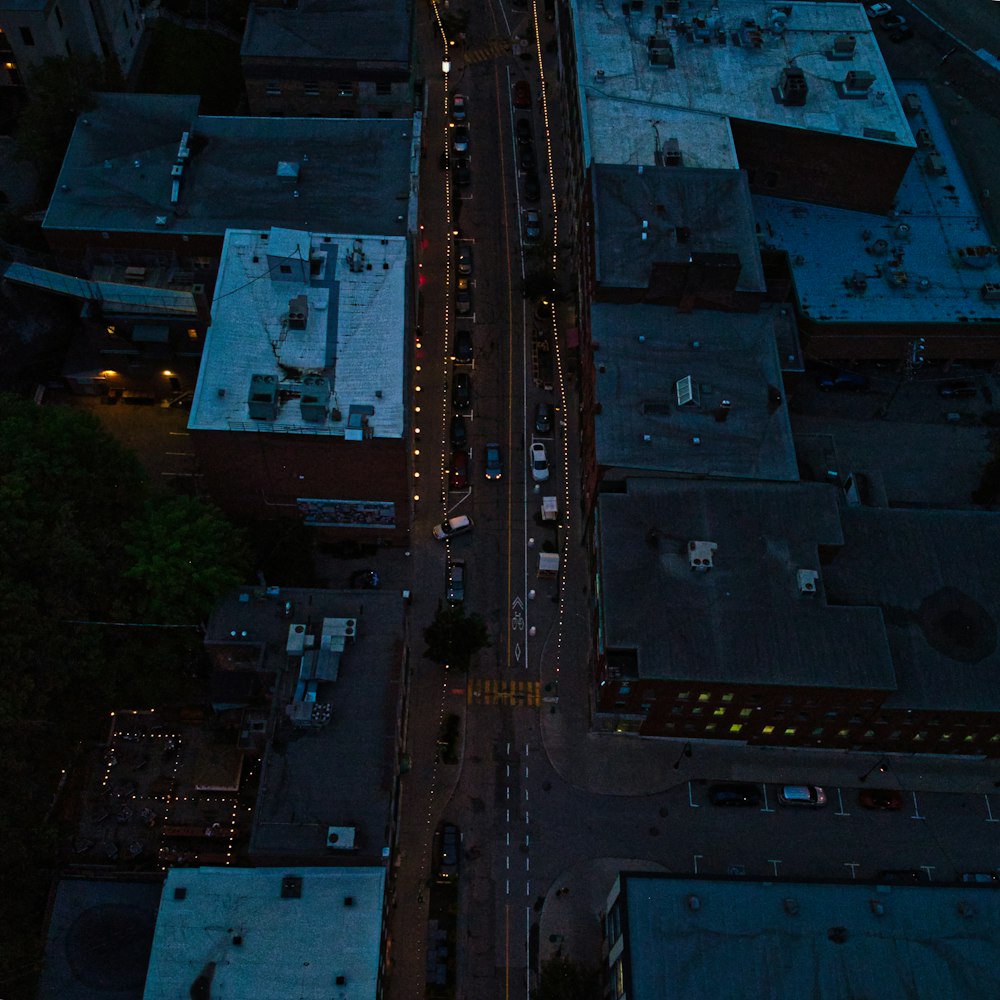 an aerial view of a city street at night