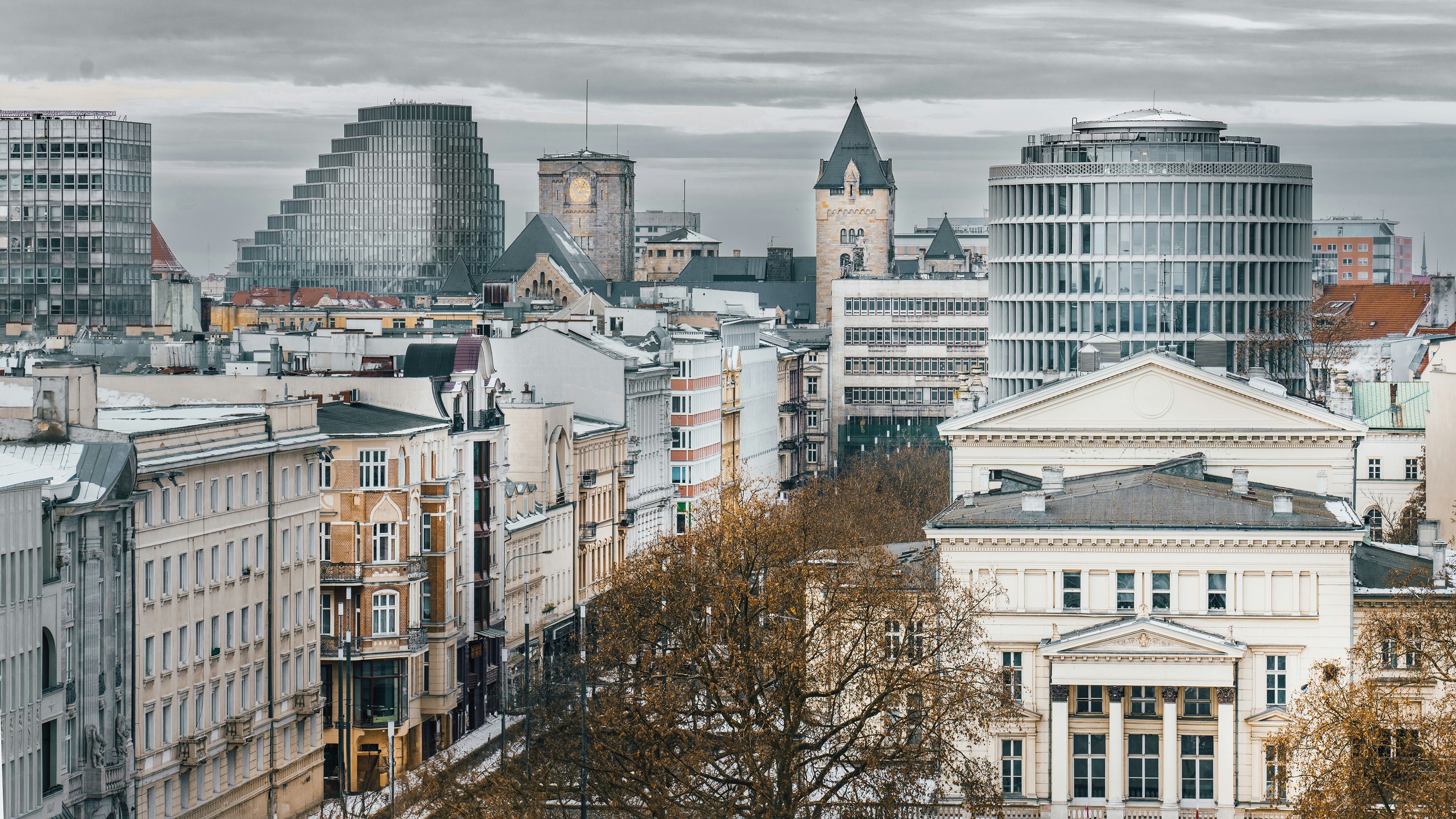 a view of a city with tall buildings, European city skyline. Buildings from above. Poznan Poland.