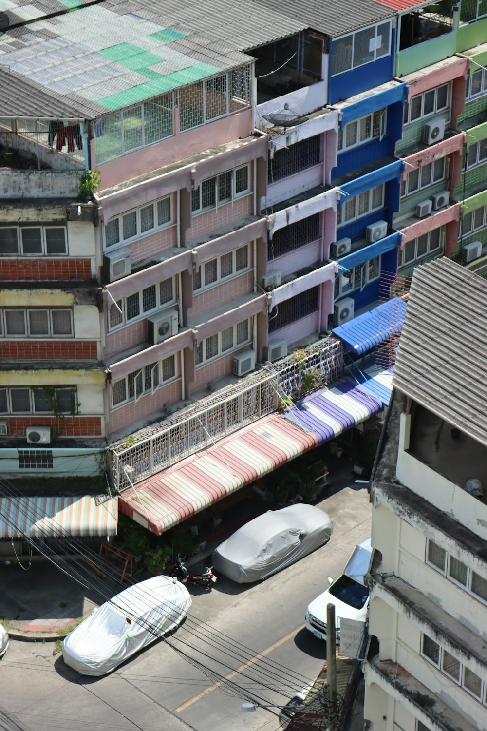 an aerial view of a multi - story building in a city