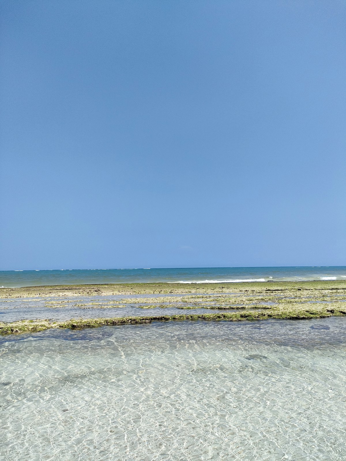Diani Beach November — the Kenyan coast with white sand during the short rains season