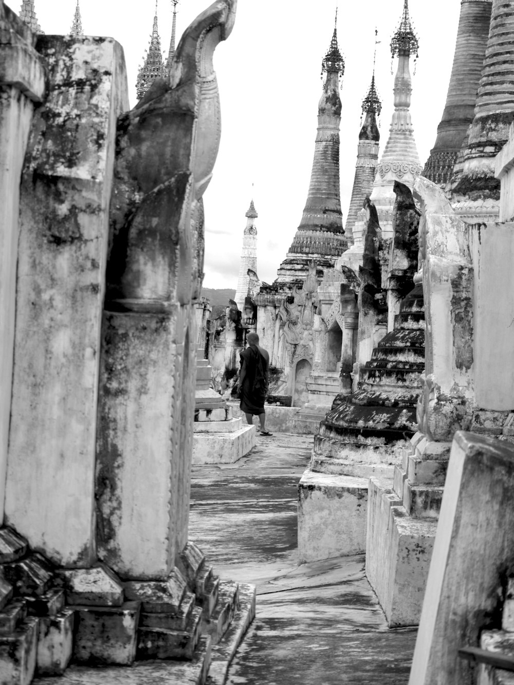 a black and white photo of a cemetery