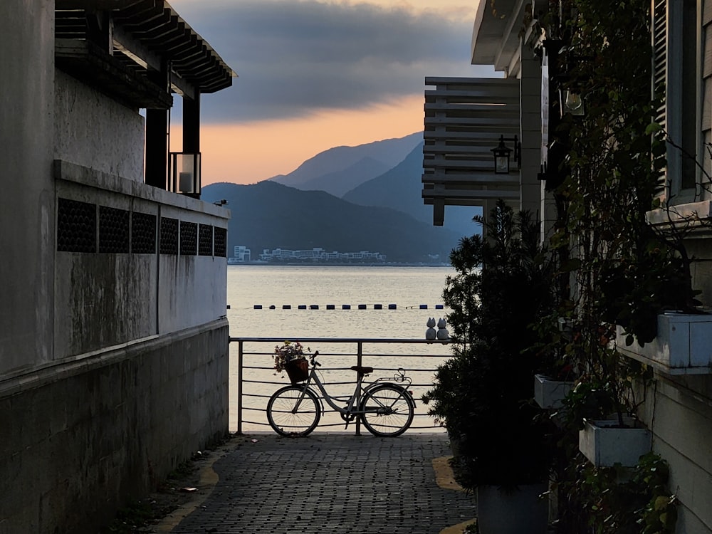 a bike is parked on the side of a building