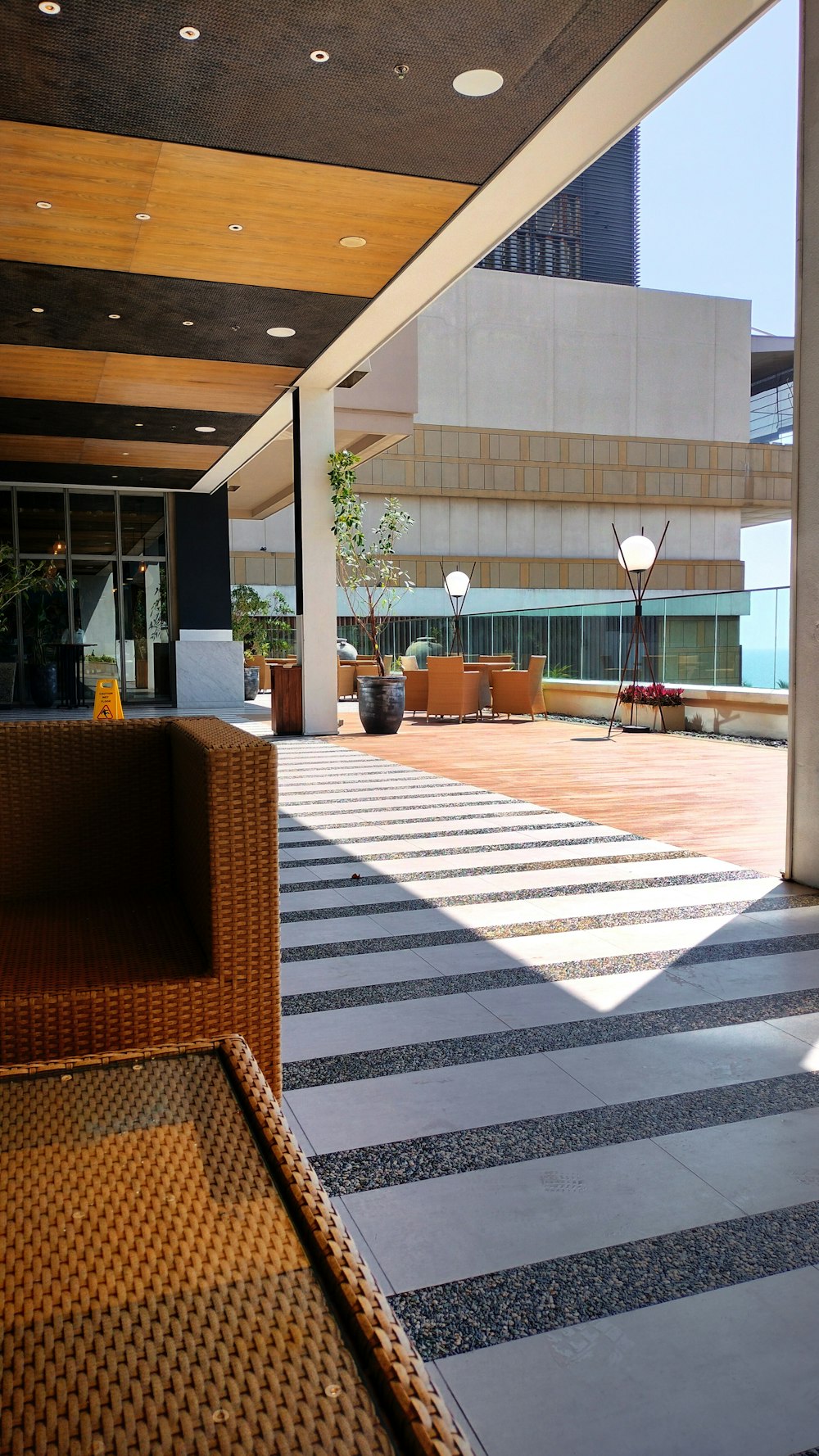 a large room with a checkered floor and chairs