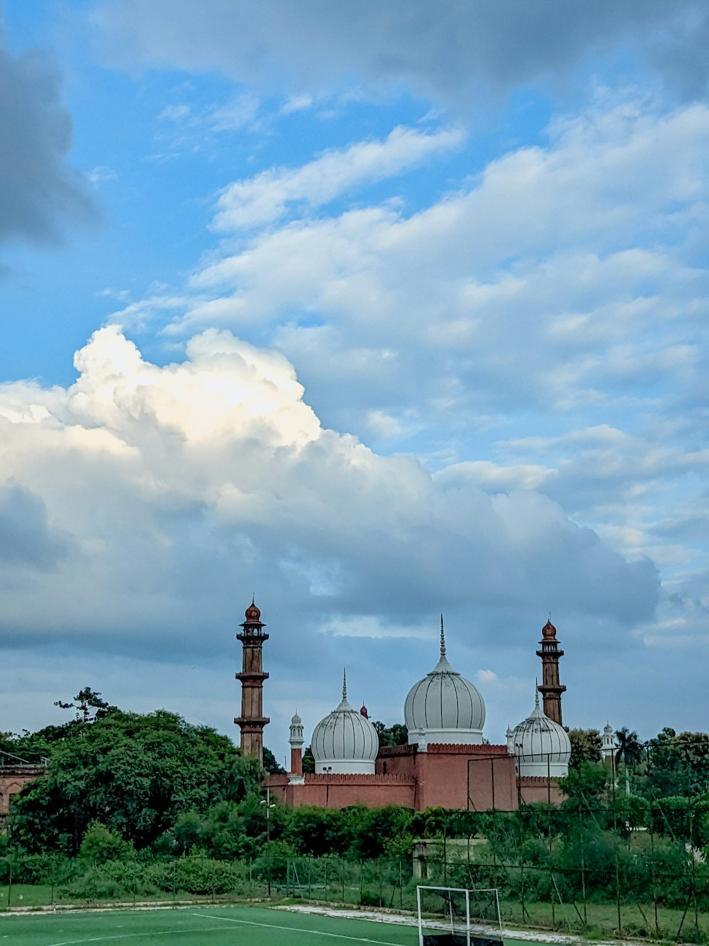 a large building with two domes on top of it