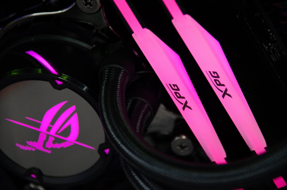 a close up of a pair of pink headphones