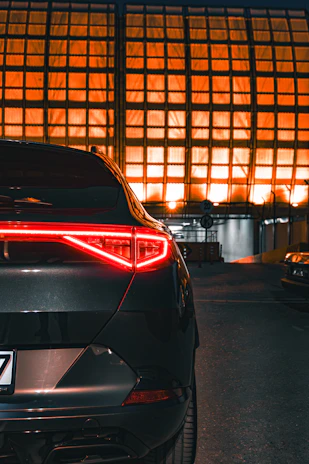 a car is parked in front of a building