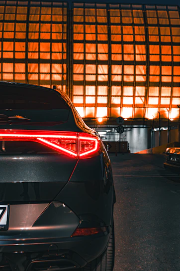 a car is parked in front of a building
