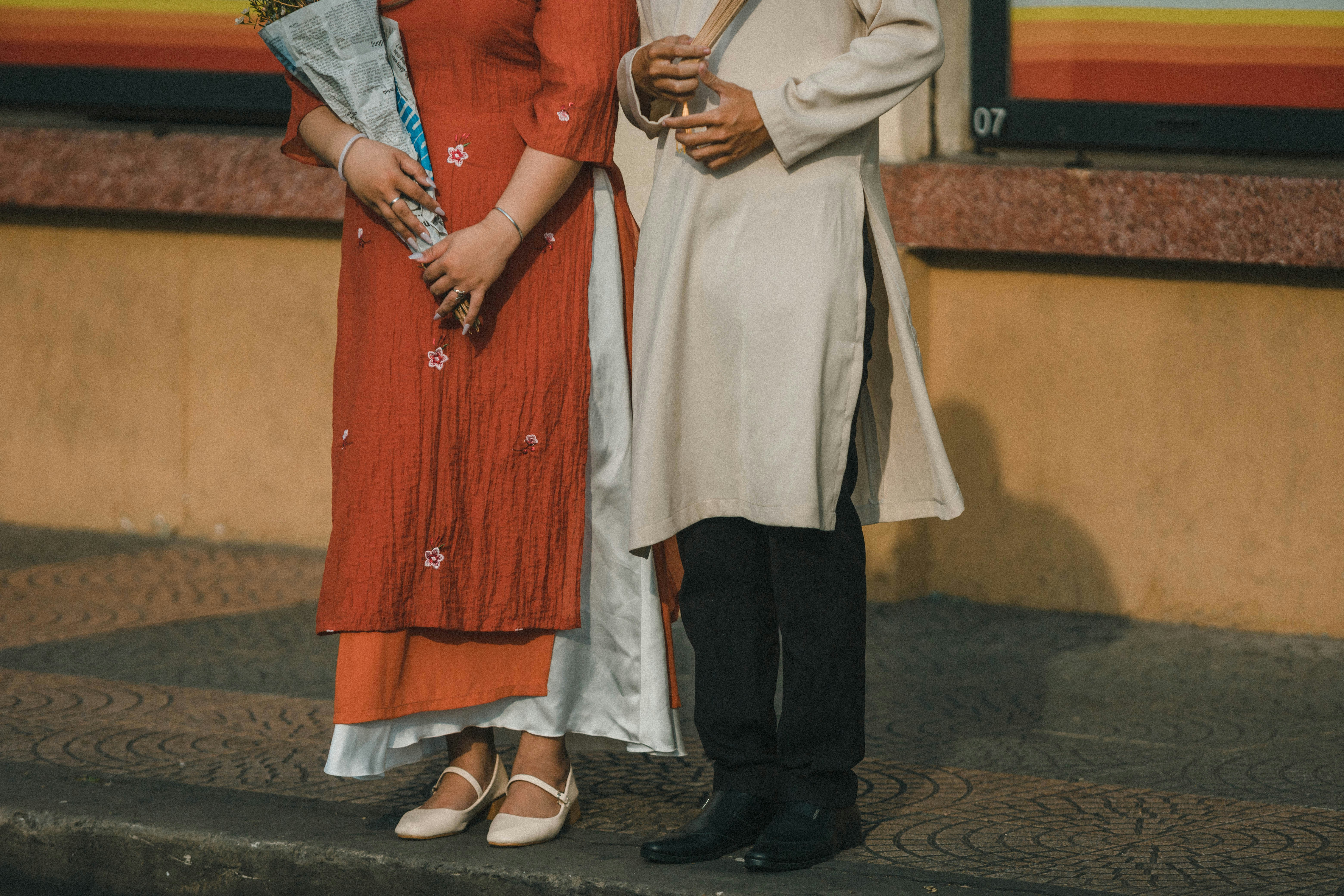 a man and a woman standing next to each other