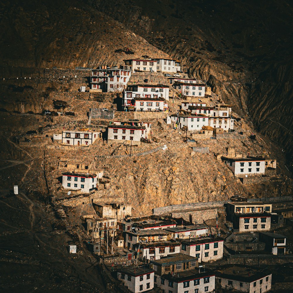 a group of buildings sitting on top of a mountain