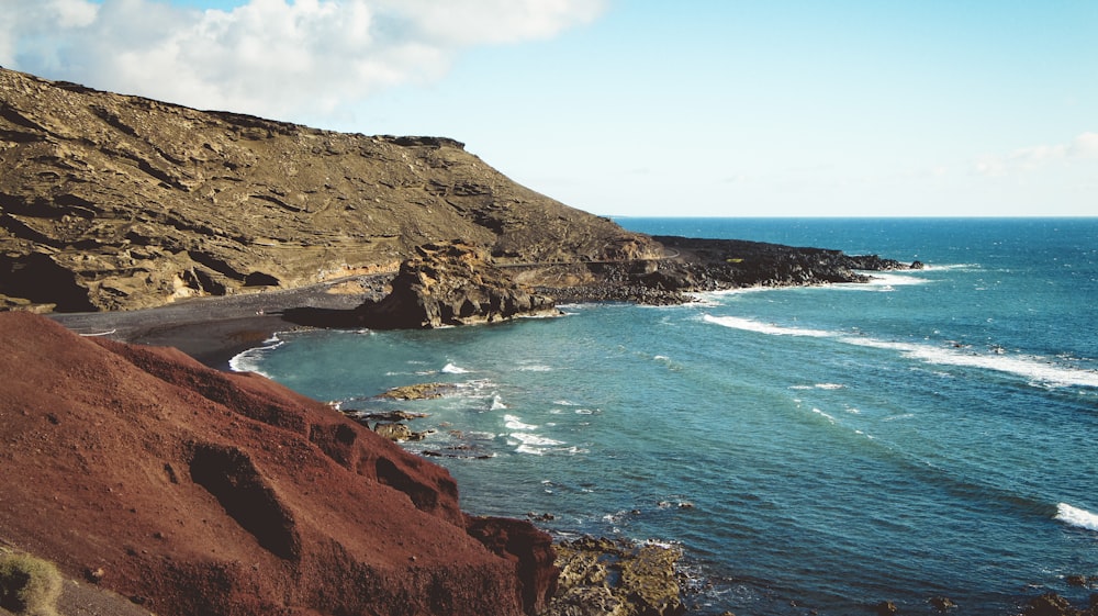 a view of the ocean from a cliff