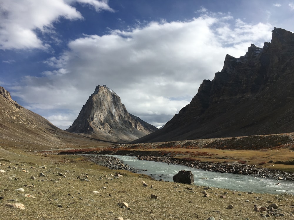 a mountain range with a river running through it