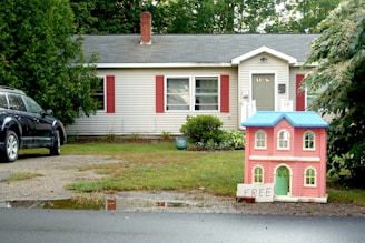 a house with a car parked in front of it