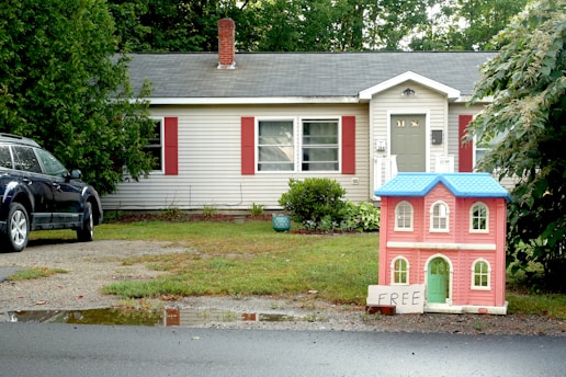 a house with a car parked in front of it