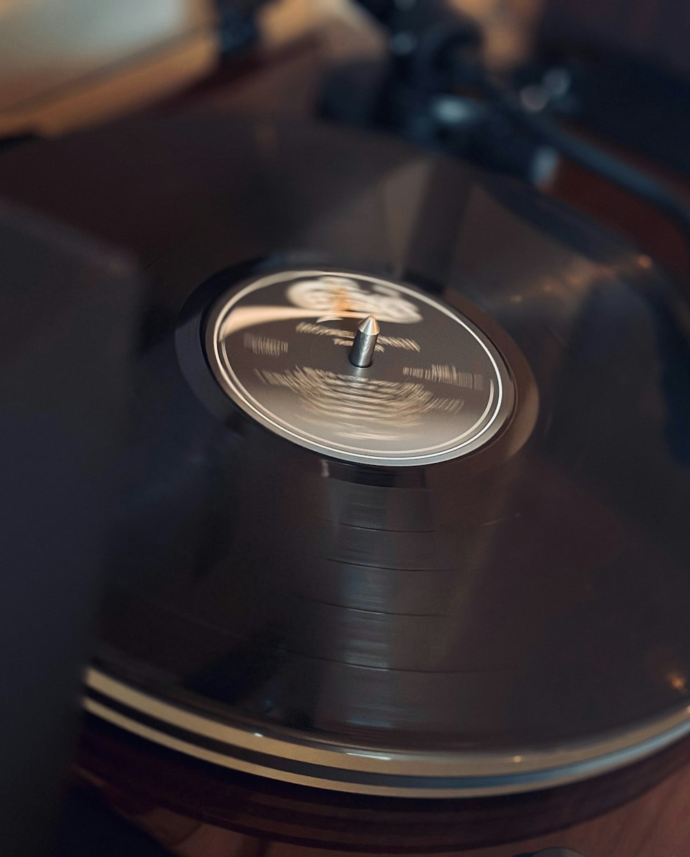a record player with a clock on top of it