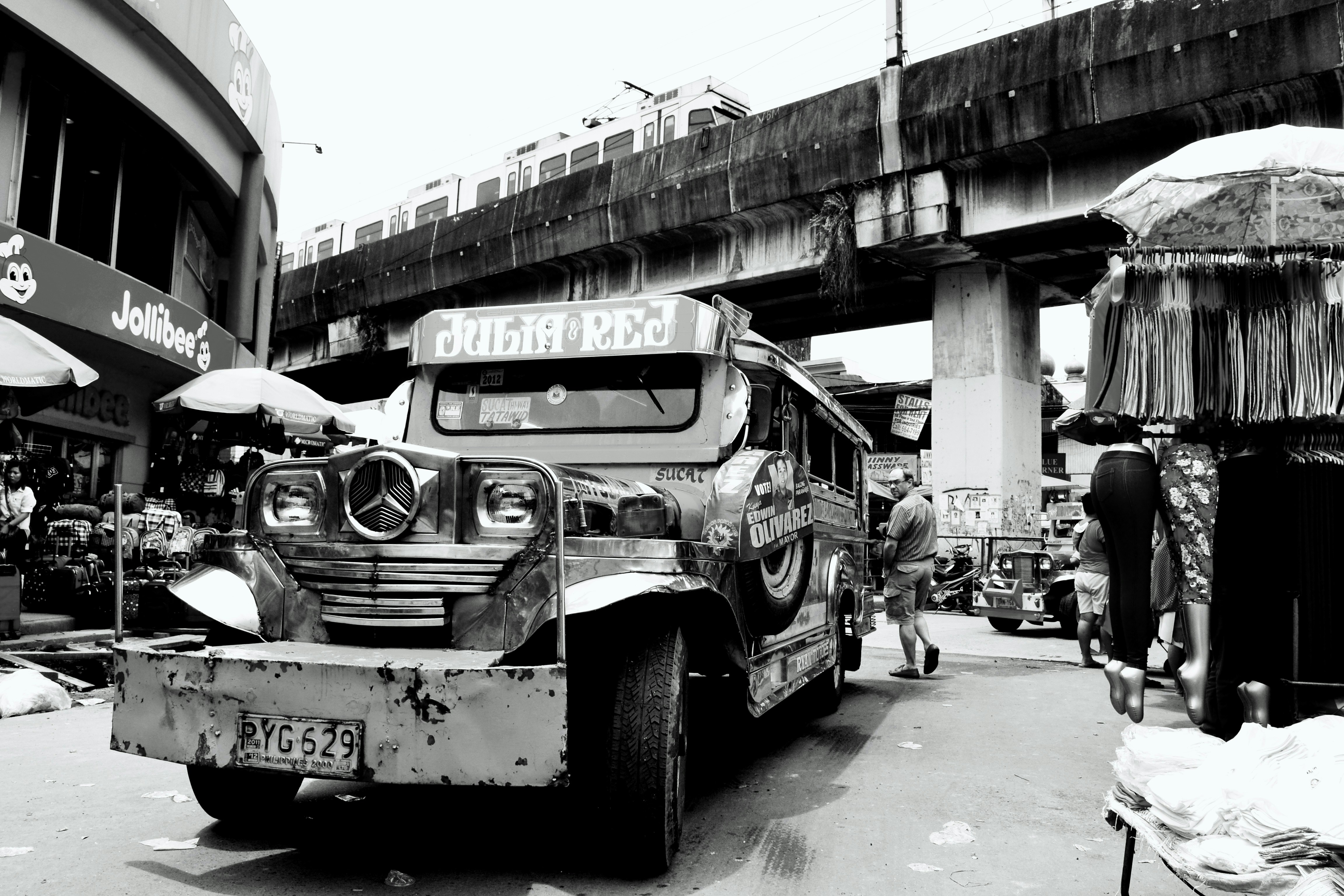a black and white photo of an old truck