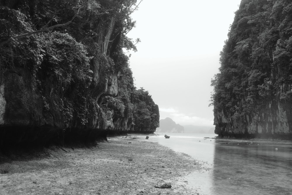 a black and white photo of a beach