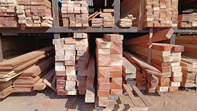 a pile of wood sitting on top of a wooden floor