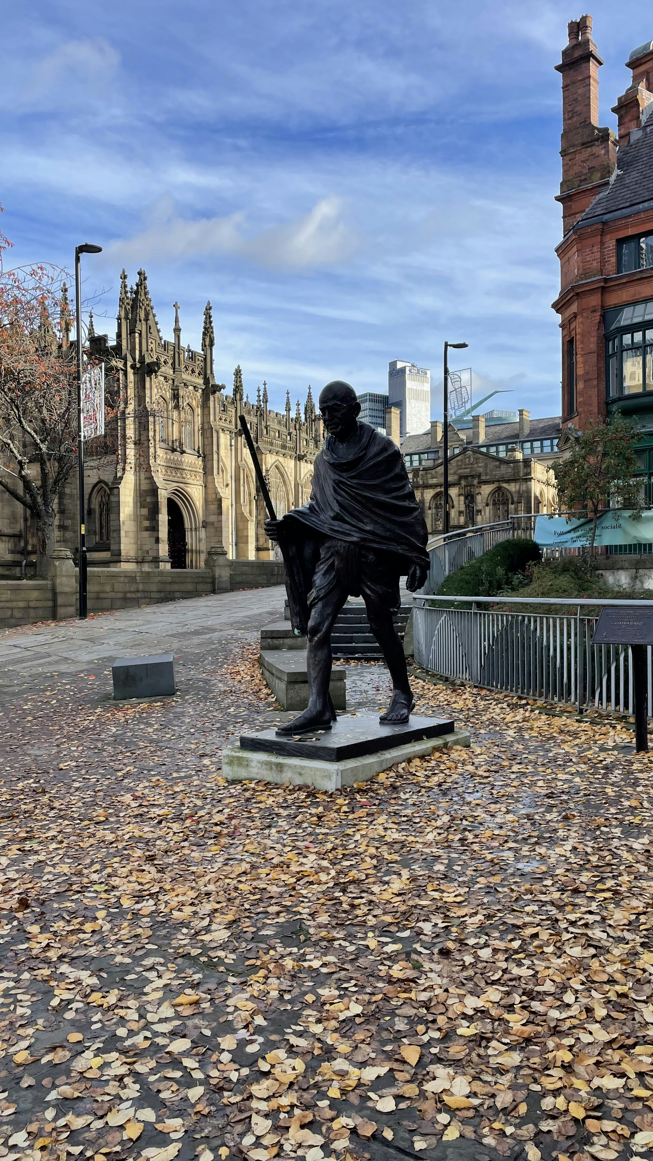 a statue of a man holding a rifle