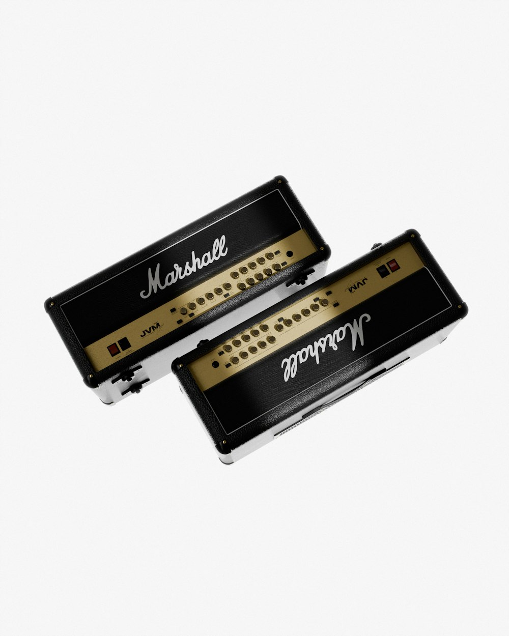 two black and gold harmonicas sitting next to each other
