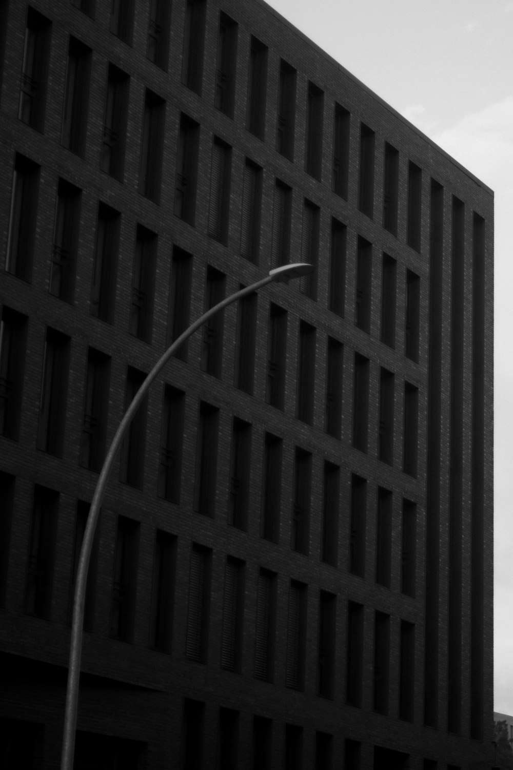 a black and white photo of a tall building